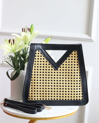Triangle handle cane bag