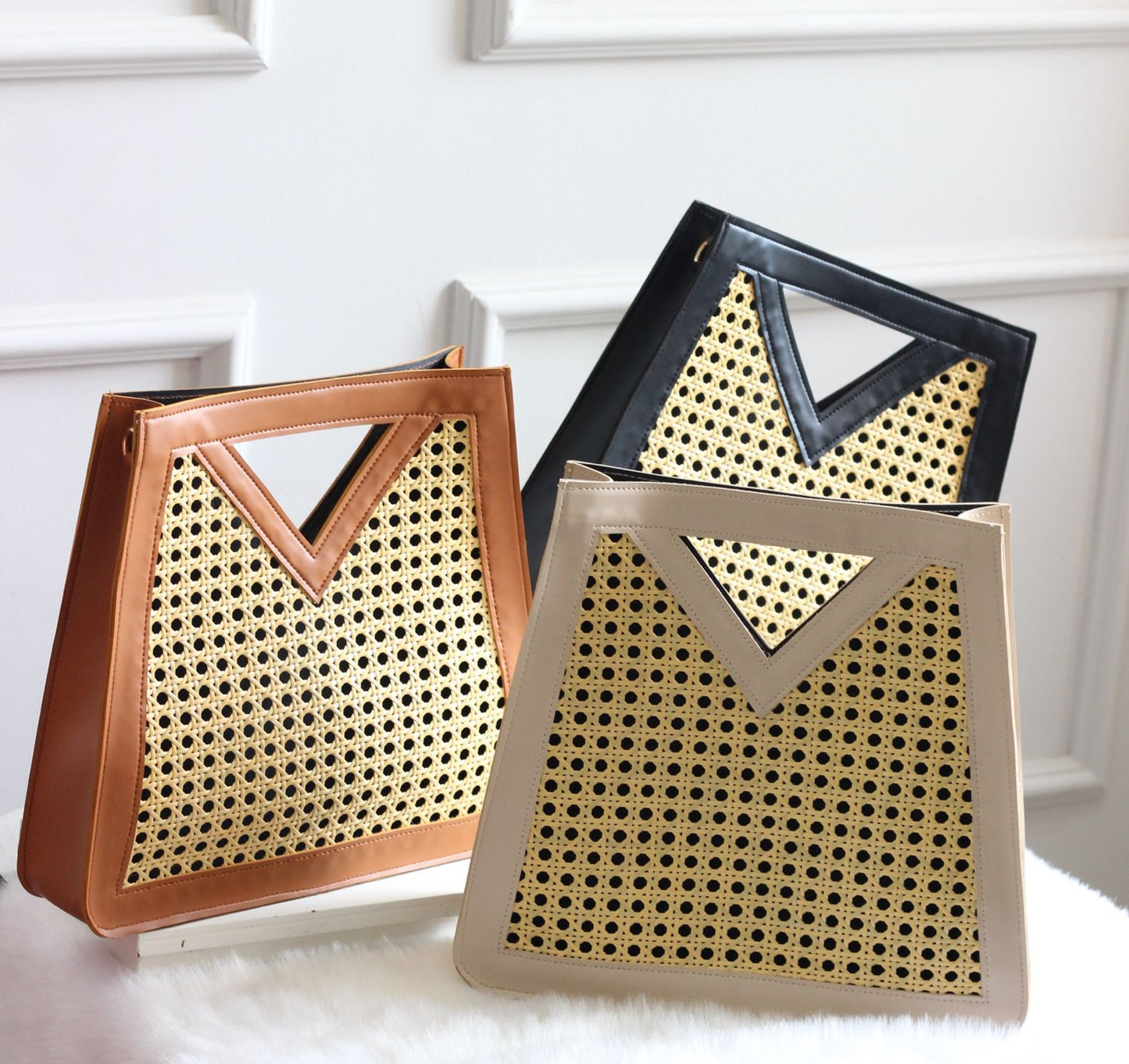 Triangle handle cane bag